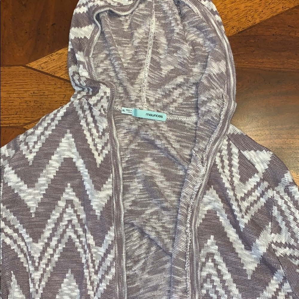 a plum and white cardigan